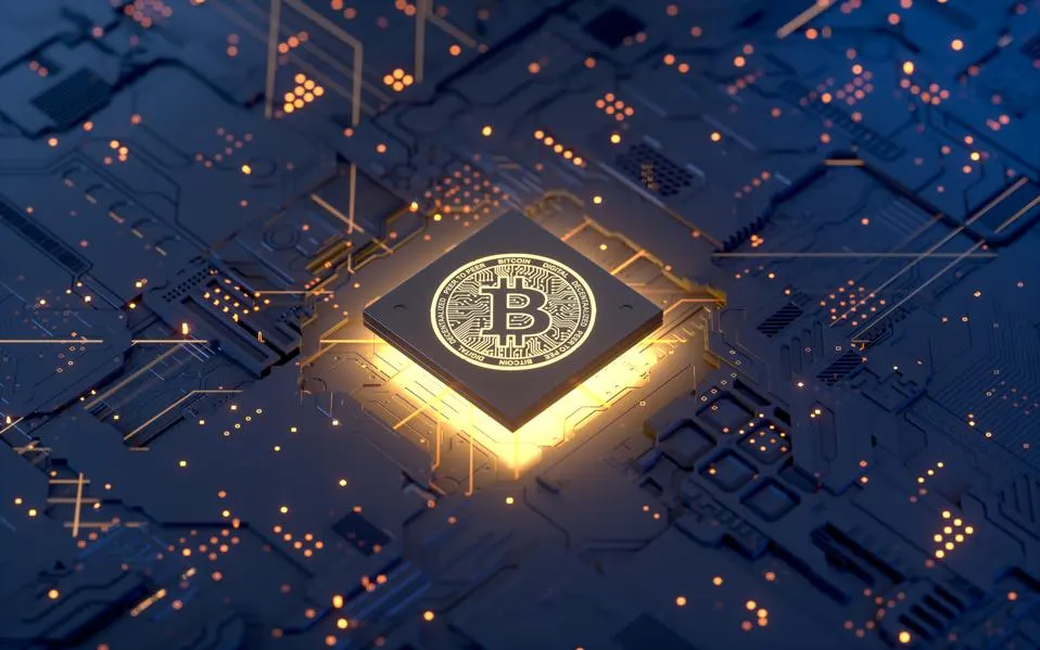 Bitcoin on motherboard, 3d rendering, conceptual image. GETTY